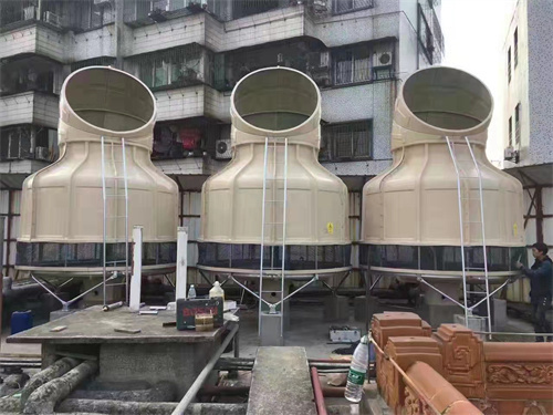 夏季冷卻塔溫度高，很難冷卻怎么辦？(冷卻塔放在車間好